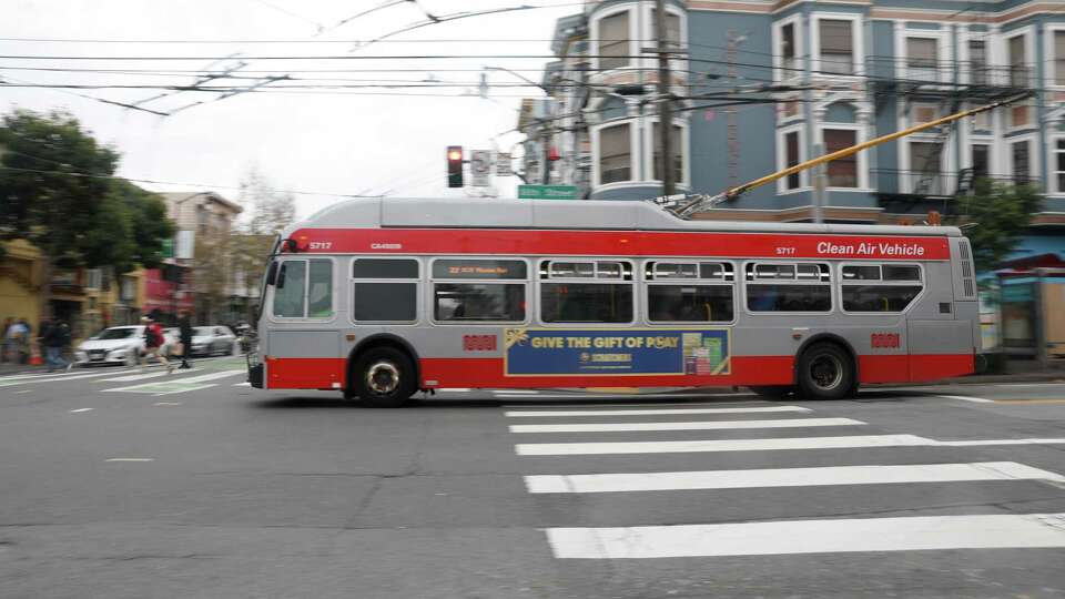 A 22 Fillmore Muni bus travels down 16th Street on Friday, December 20, 2024 in San Francisco, Calif.