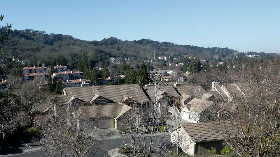 Homes and structures are seen in Rossmoor on Thursday, January 16, 2025 in Rossmoor, Calif. To buy a home in Rossmoor, the Walnut Creek retirement community, most people now have to pay cash due to complications caused by the insurance crisis and the complex nature of the development.