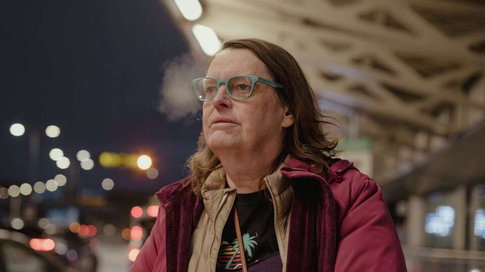 Lynn Riordan, a 66-year-old transgender woman and U.S. military veteran, checks into her flight at Toronto Pearson International Airport in Toronto, Canada on January 25, 2025. Riordan is on a three-week trip to explore options for possible asylum, fearing the explicitly anti-trans agenda of President Donald Trump. Photo by Chloe Ellingson.