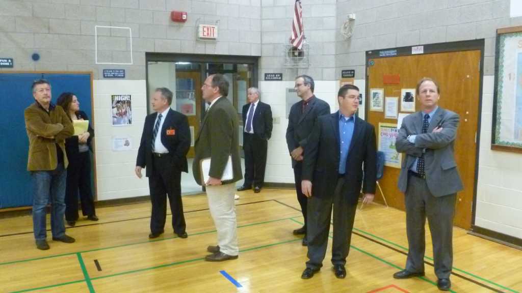 Board members check if Holland Hill School makes the grade