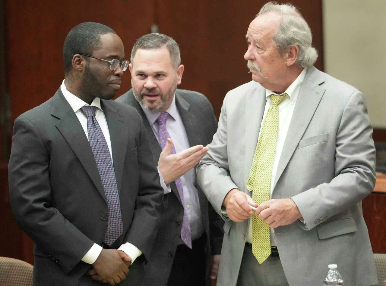 Defendant Xavier Davis, left, and his defense attorneys Justin Keiter, center, and Casey Keirnan, right, are shown before jury selection for his trial at the Harris County Criminal Justice Center, 1201 Franklin, Wednesday, Feb. 12, 2025, in Houston.