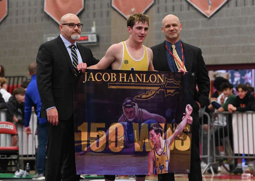 Image showcasing 11 No. 1 seeds prevail at 2025 Division I wrestling championships