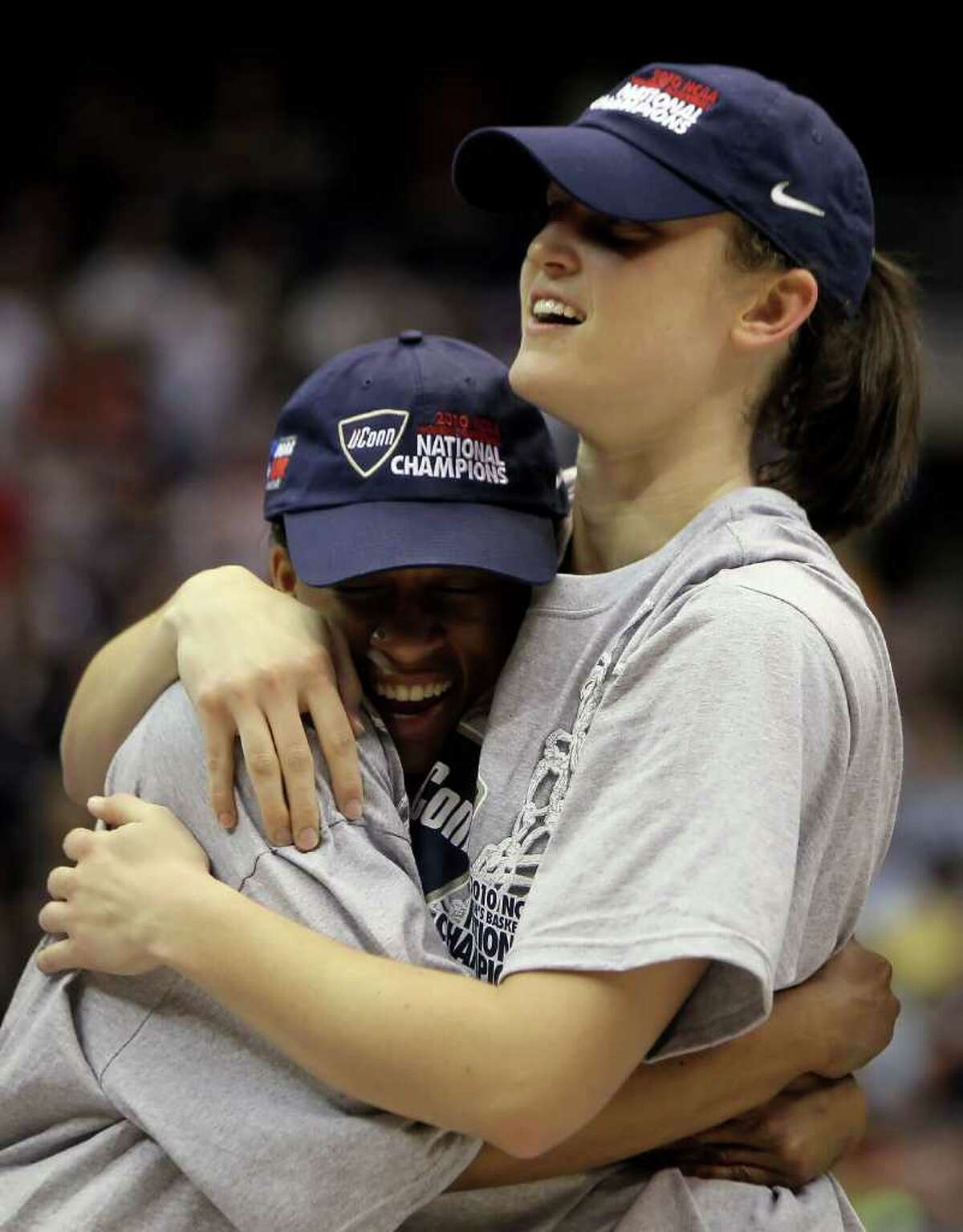SAN ANTONIO - APRIL 06: Lorin Dixon (L) and Kelly Faris of the Connecticut Huskies hug each other as they celebrate after a 53-47 victory over the Stanford Cardinal during the NCAA Women's Final Four Championship game at the Alamodome on April 6, 2010 in San Antonio, Texas. (Photo by Jeff Gross/Getty Images) *** Local Caption *** Lorin Dixon;Kelly Faris