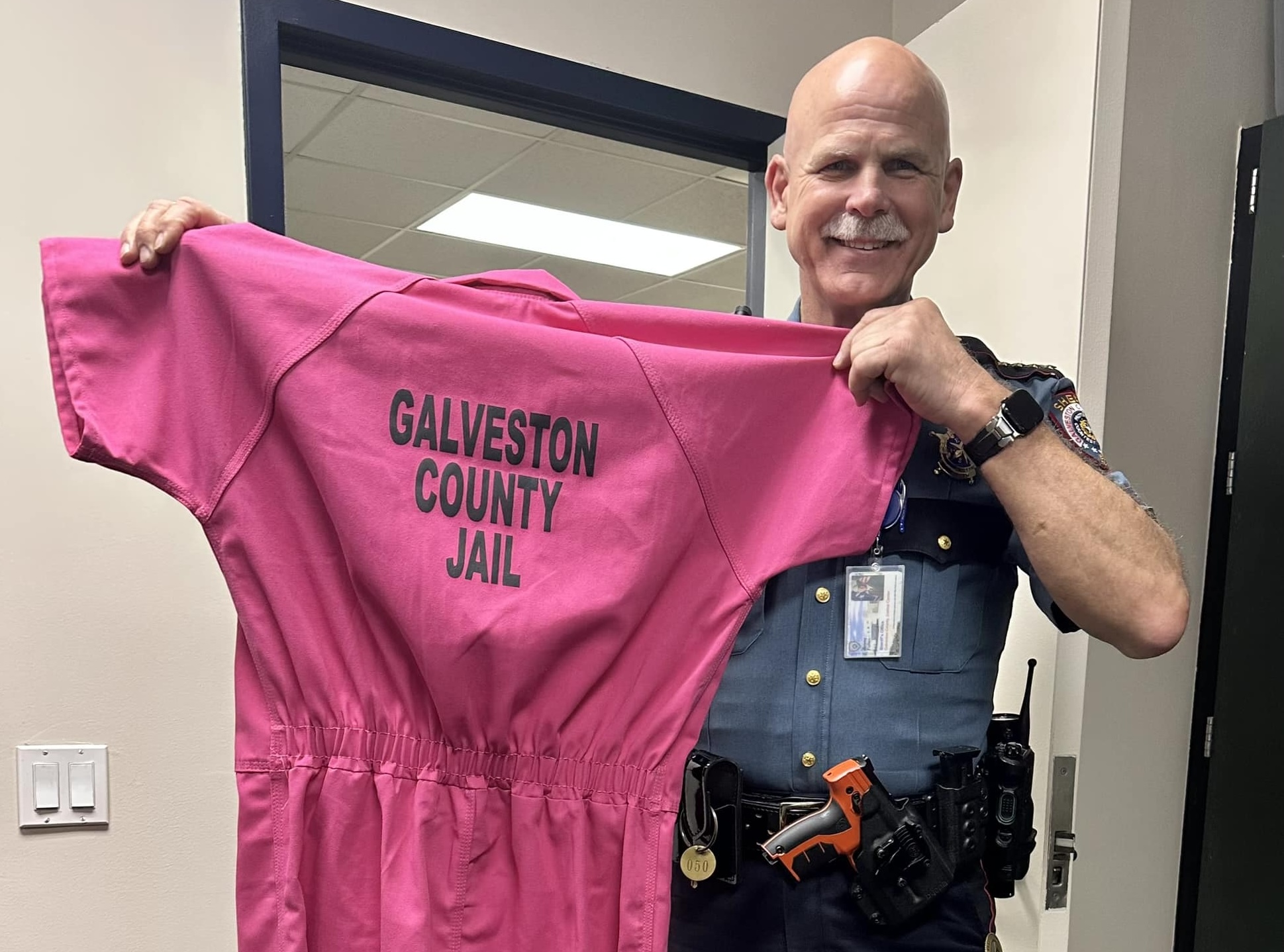 Galveston County residents react to pink jail uniforms