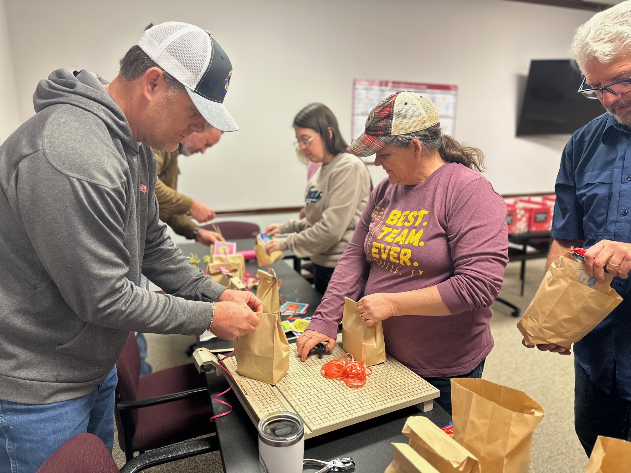 Conroe Noon Lions complete breakfast bags for Meals on Wheels