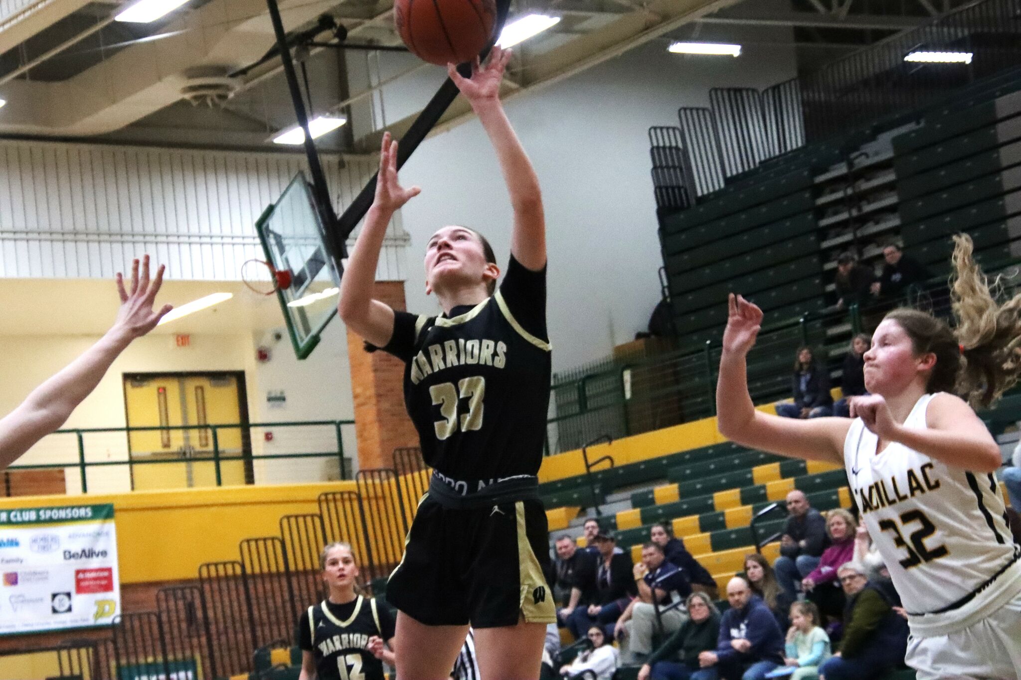 Bay City Western girls drop nail-biter in district opener