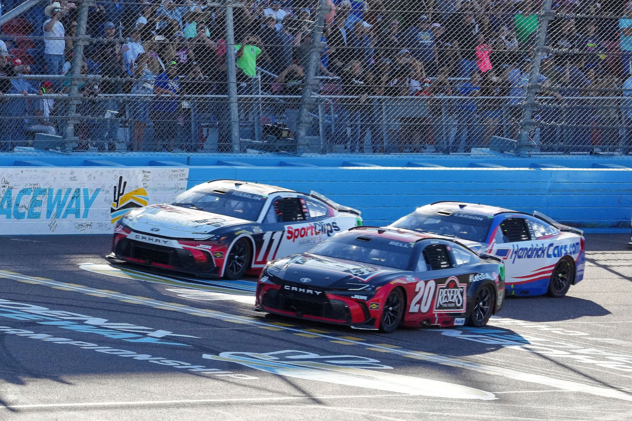 Christopher Bell holds off Denny Hamlin at Phoenix to win third ...