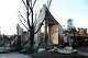 Charred entrance of a home after the Palisades Fire