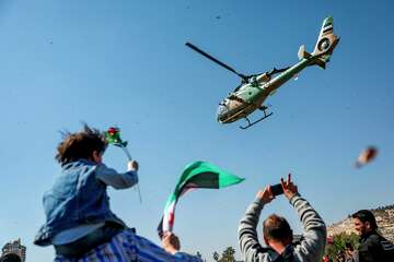 Syrians mark 14th anniversary of civil war uprising by celebrating the ...