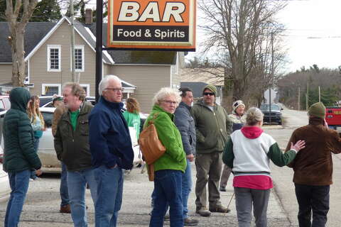 Green attire brightens gray day in Filer Twp.