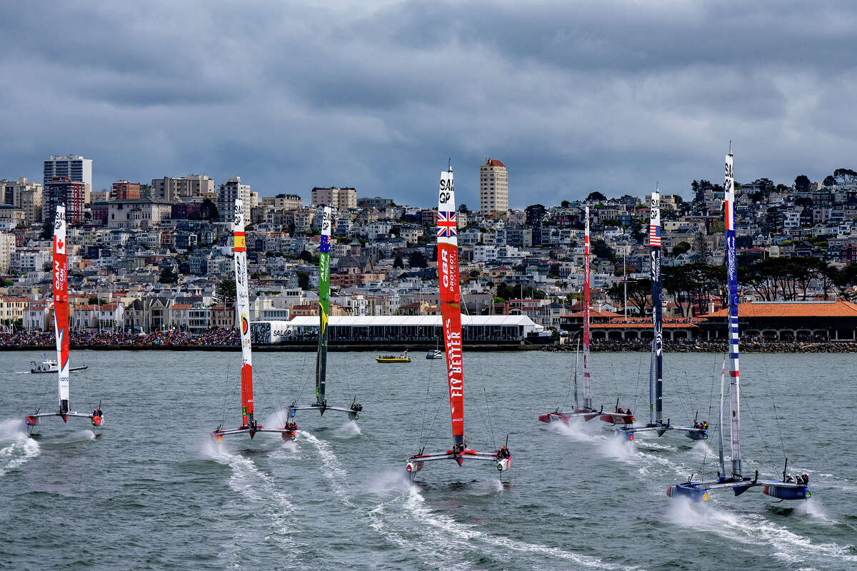 Emirates Great Britain SailGP Team helmed by Ben Ainslie sail in the middle of the fleet as the F50 catamarans sail towards the shore line on Race Day 1 of the Mubadala SailGP Season 3 Grand Final in San Francisco, USA. May 6, 2023. 