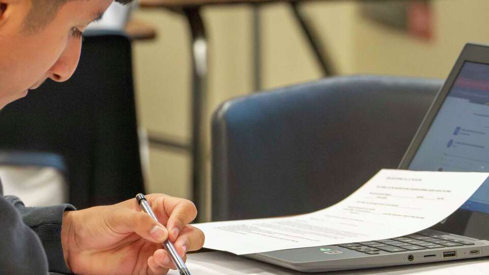 A Hastings High School student uses CollegeSpring software to complete practice test exercises in English vocabulary as he prepares for the mandated Texas Success Initiative Assessment in Houston, Wednesday, March 26, 2025.
