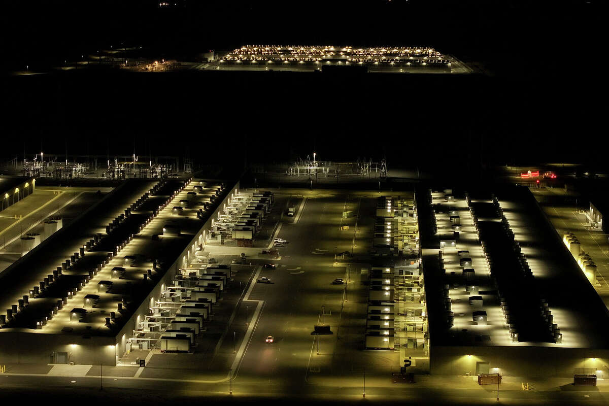 An Amazon Web Services data center in Oregon is seen at night. 