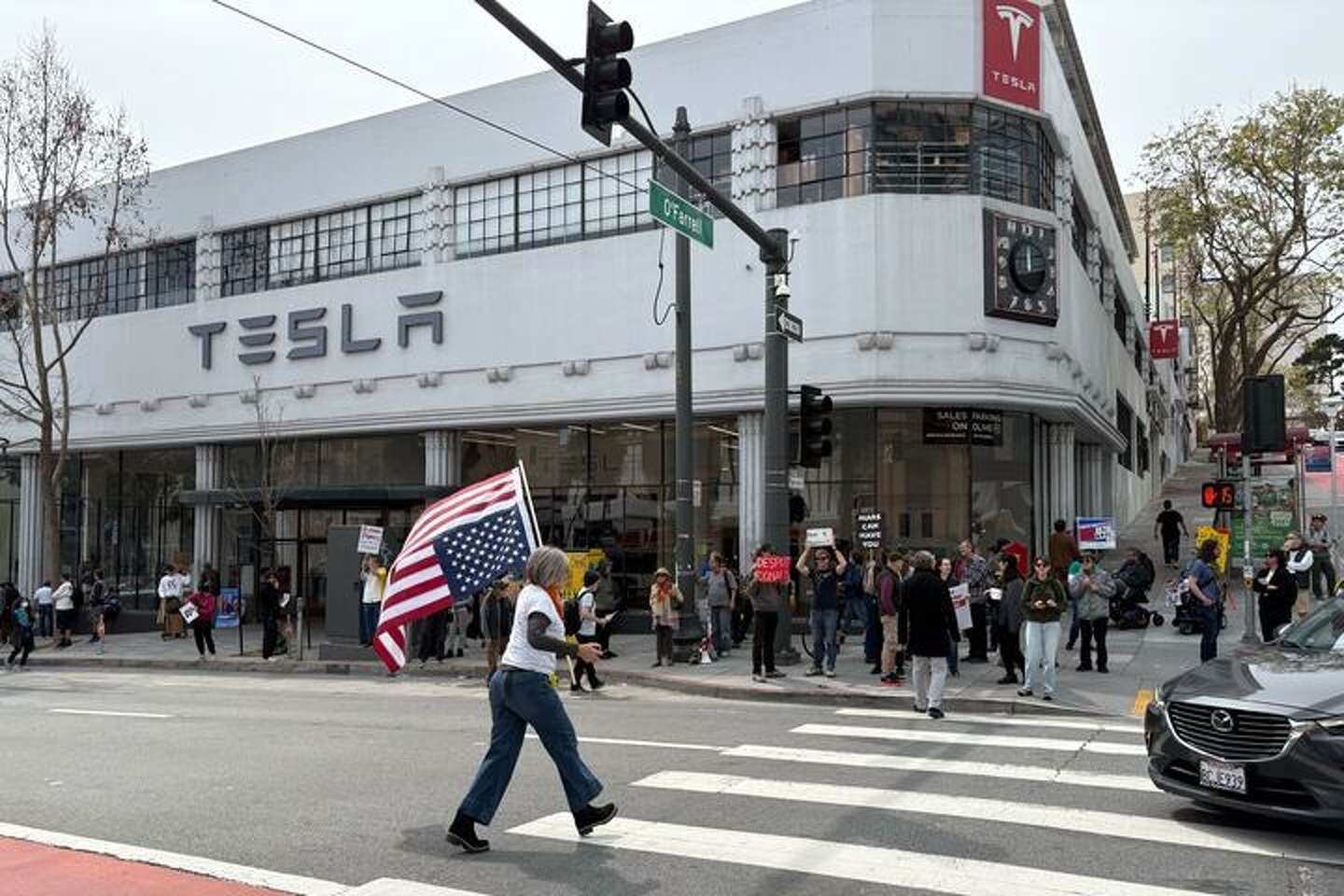 Hundreds protest Musk at SF Tesla dealership on global day of action