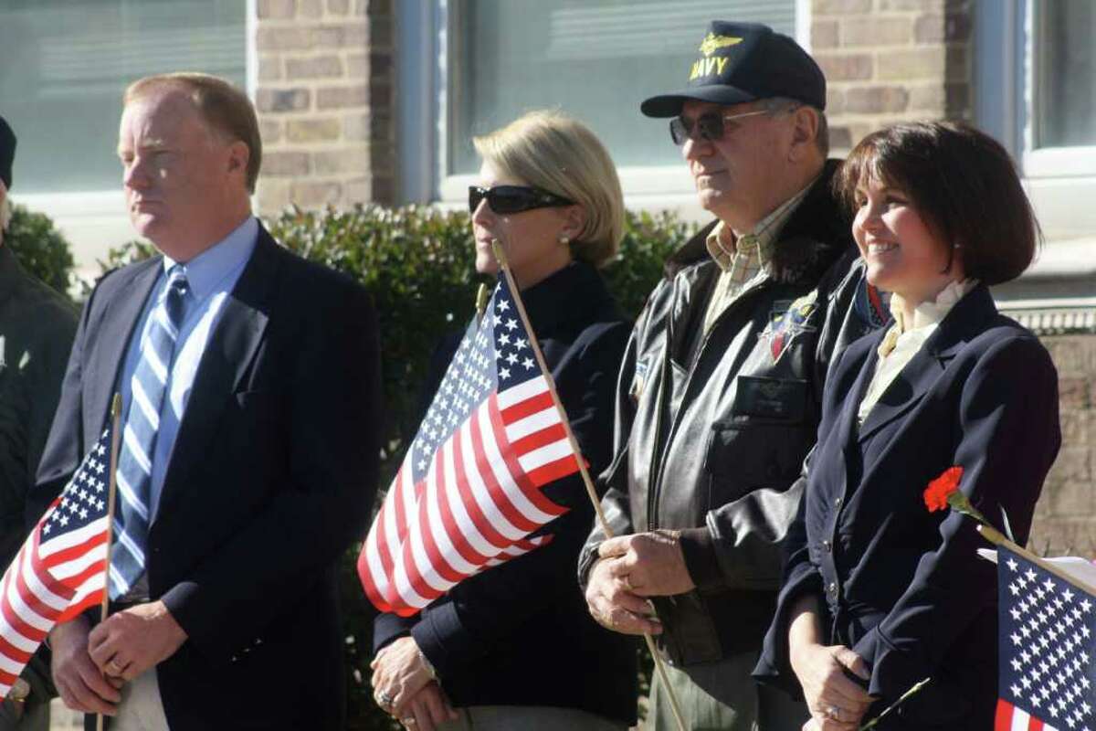 Members of the Board of Selectmen and residents gathered outside of Town Hall for Thursday's Veteran's Day celebration.