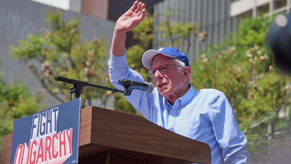 Sen. Bernie Sanders, I-Vt., waves to the crowd during a 'Fighting Oligarchy' event in Los Angeles, Saturday, April 12, 2025.