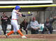 Danbury’s Sophie O’Connell (#10) fouls off a pitch in the girls high school softball game between New Canaan and Danbury high schools. Tuesday, April 15, 2025, Danbury High School, Danbury, Conn.