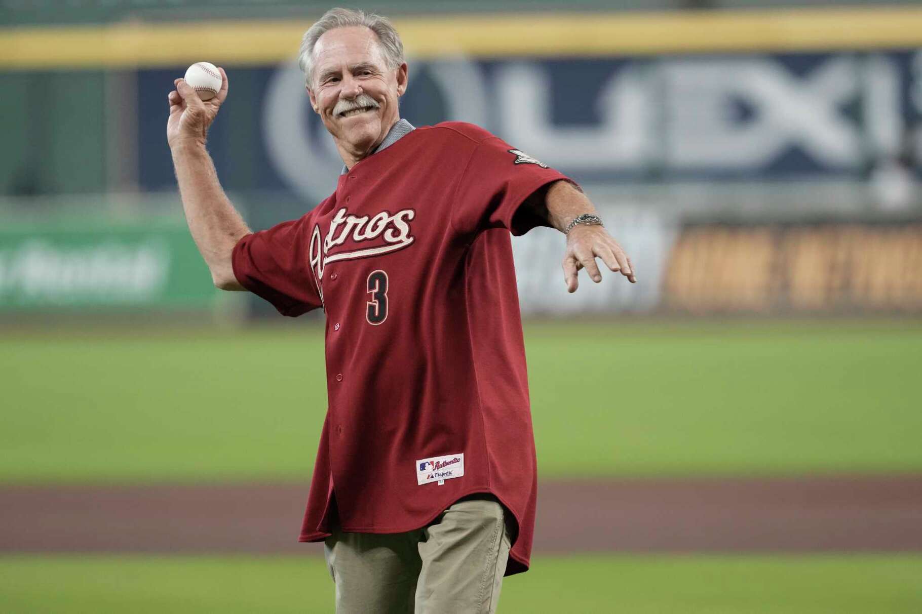 Former Houston Astros player and manager Phil Garner throws a ceremonial first pitch before a MLB game between the Astros and Detroit Tigers at Daikin Park in Houston, Wednesday, April 30, 2025.