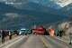Rescue workers at the scene of the deadly collision between a pickup truck and tour van near Henry's Lake State Park in eastern Idaho on Thursday, May 1, 2025. (Roger Merrill via AP)