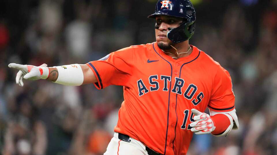 Houston Astros Isaac Paredes (15) celebrates after hitting solo, walk-off home run against Kansas City Royals relief pitcher John Schreiber to give the Astros a 2-1 win in the ninth inning of an MLB baseball game at Daikin Park in Houston, Tuesday, May 13, 2025.