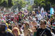 Runners make their way up Hayes Street in San Francisco during the 2025 Bay to Breakers race on May 18, 2025.