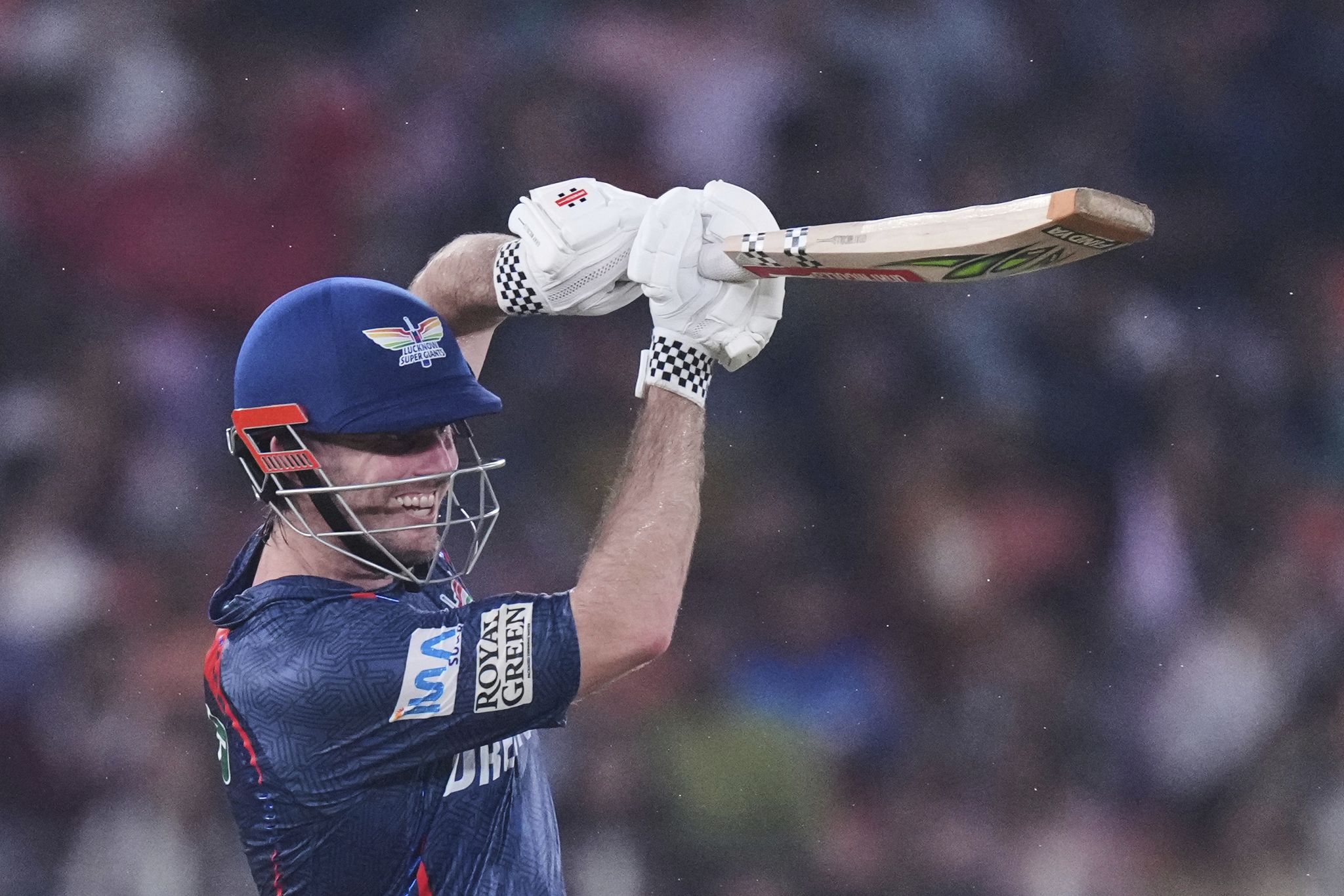 Marsh's century earns Lucknow a 33-run win over IPL-leading Gujarat