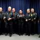 Harris County Constables Alan Rosen, Pct. 1, from left, Mark Herman, Pct. 4, Phil Sandlin, Pct. 8, Silvia Trevino, Pct. 6, Terry Allbriton, Pct. 5, Jerry Garcia, Pct. 2 and James “Smoke” Phillips, Pct. 7, gather together for a photo during a news conference in Houston, Thursday, May 22, 2025. Harris County constables are joined by Harris County commissioners and law-enforcement labor leaders to discuss pay raises for constable deputies.