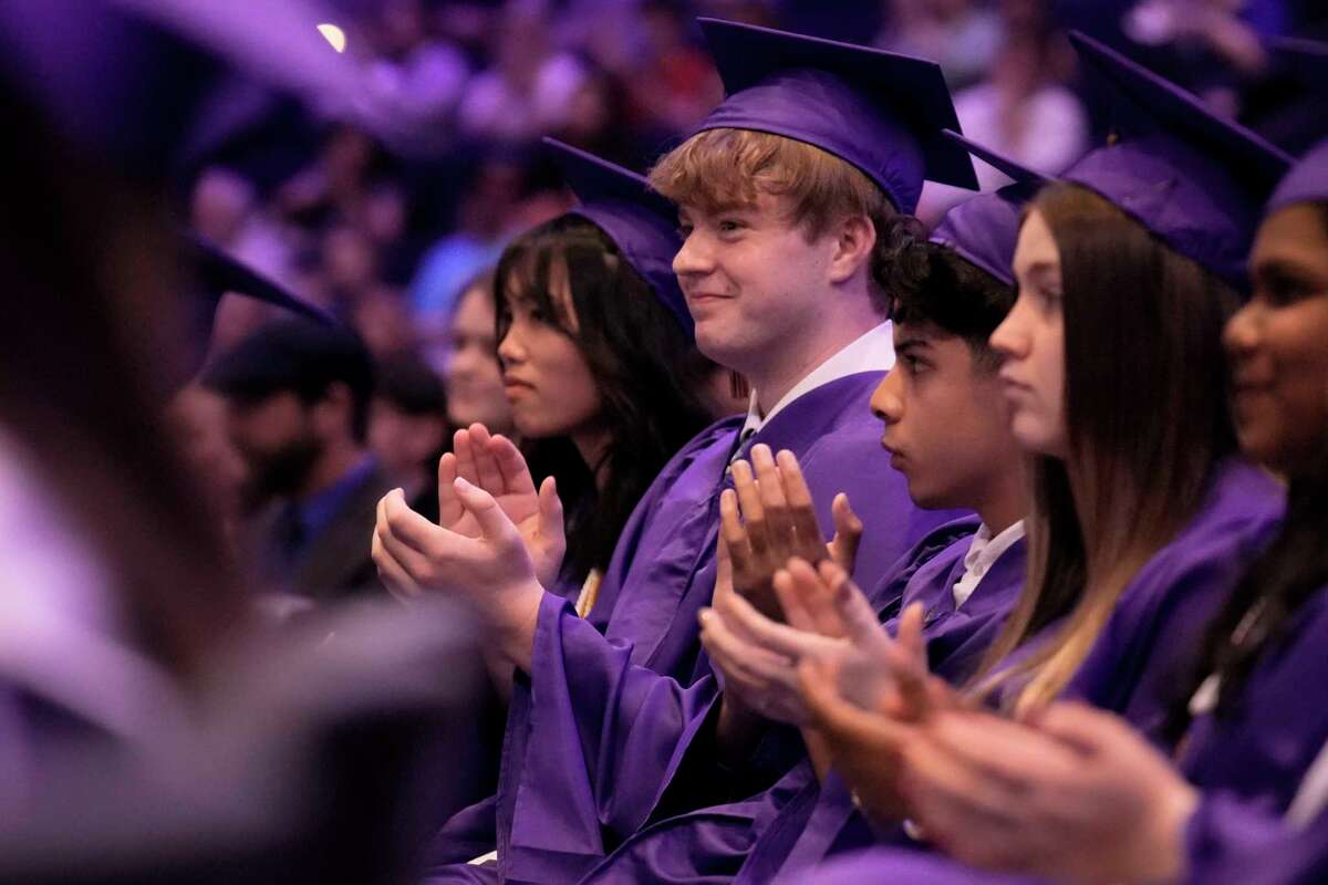 Tomball STAR Academy, the district's early college high school, graduates are photographed during commencement ceremony at The MET Church in Houston, Thursday, May 22, 2025.