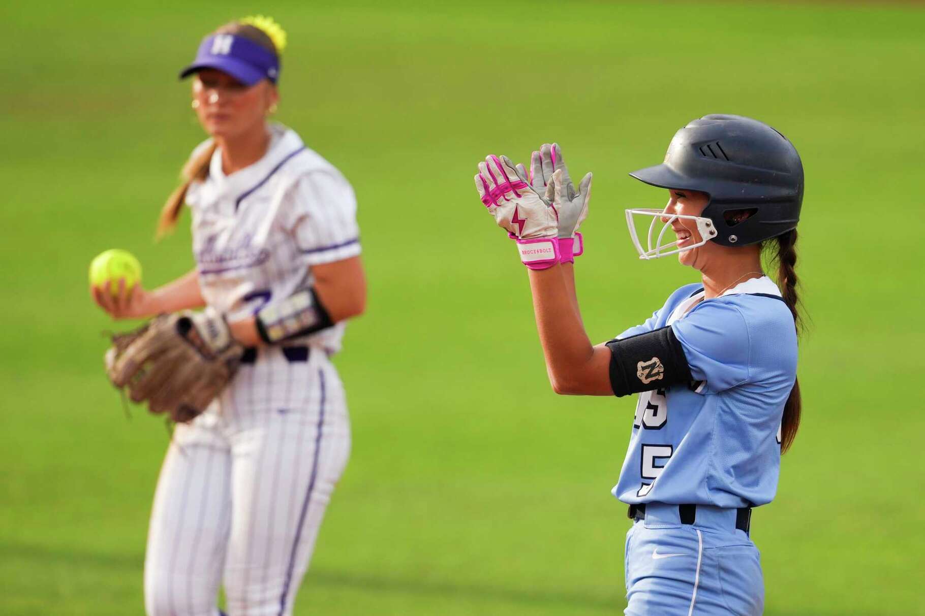 Lake Creek's Miranda Orso reacts after hitting an RBI double in the seventh inning of the Class 5A Division II championship during the UIL State Softball Championships in Austin, Saturday, May 31, 2025.