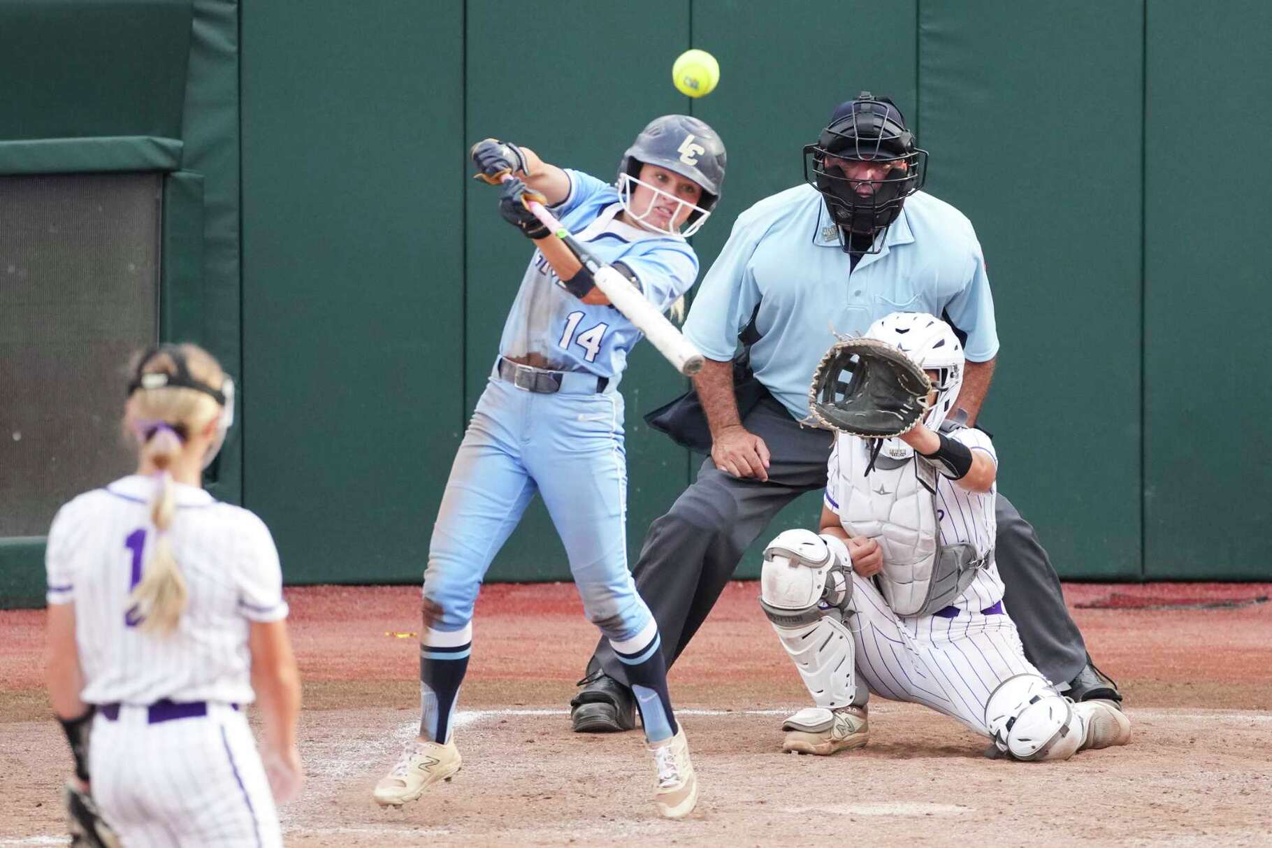 Lake Creek's Madalyn Davis hits an RBI triple in the fifth inning of the Class 5A Division II championship during the UIL State Softball Championships in Austin, Saturday, May 31, 2025.
