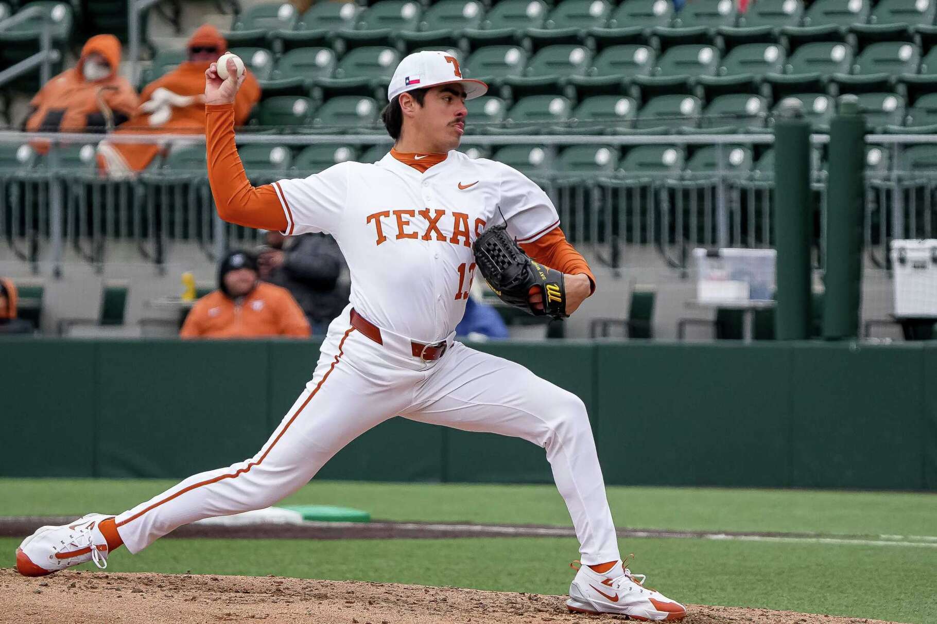 Texas Longhorns pitcher Ruger Riojas (13) throws a pitch during the game against Dartmouth at UFCU Disch-Falk Field on Friday, Feb. 21, 2025.