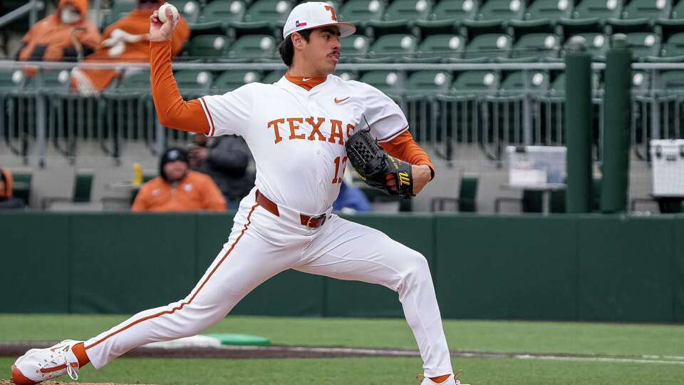 Texas Longhorns pitcher Ruger Riojas (13) throws a pitch during the game against Dartmouth at UFCU Disch-Falk Field on Friday, Feb. 21, 2025.