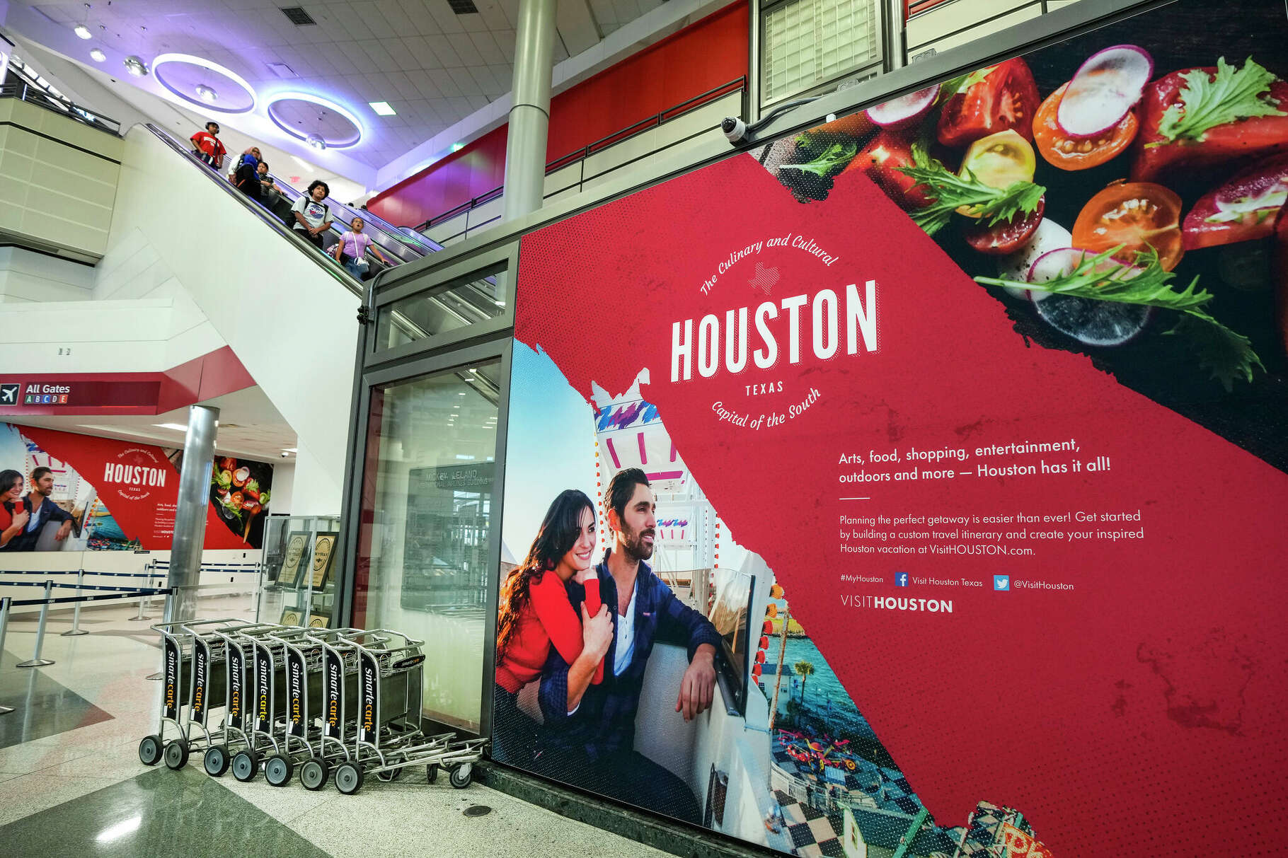 Passengers make their way through Terminal D at George Bush Intercontinental Airport in 2024 in Houston. The airport provides some of the inspiration for the second season of 'The Rehearsal.'