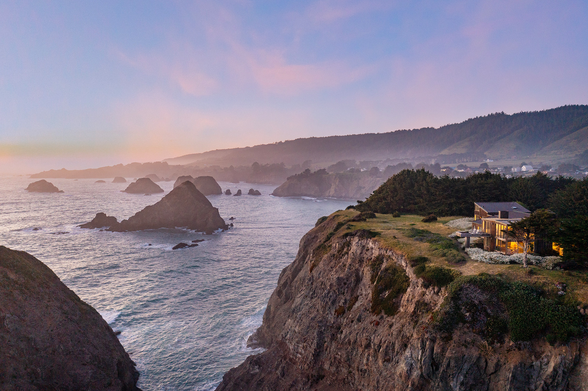 This $7.5M California coast home has its own sea arch and island