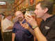 Toronado owner Dave Keene, left, with Denis Dominique, brewmaster at the Abbey of Scourmount in Belgium, at the bar in 2003.