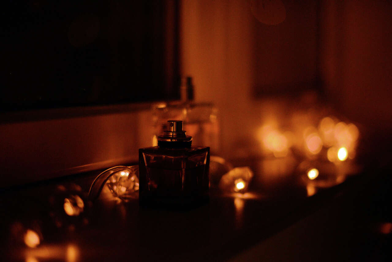 Perfume and string lights