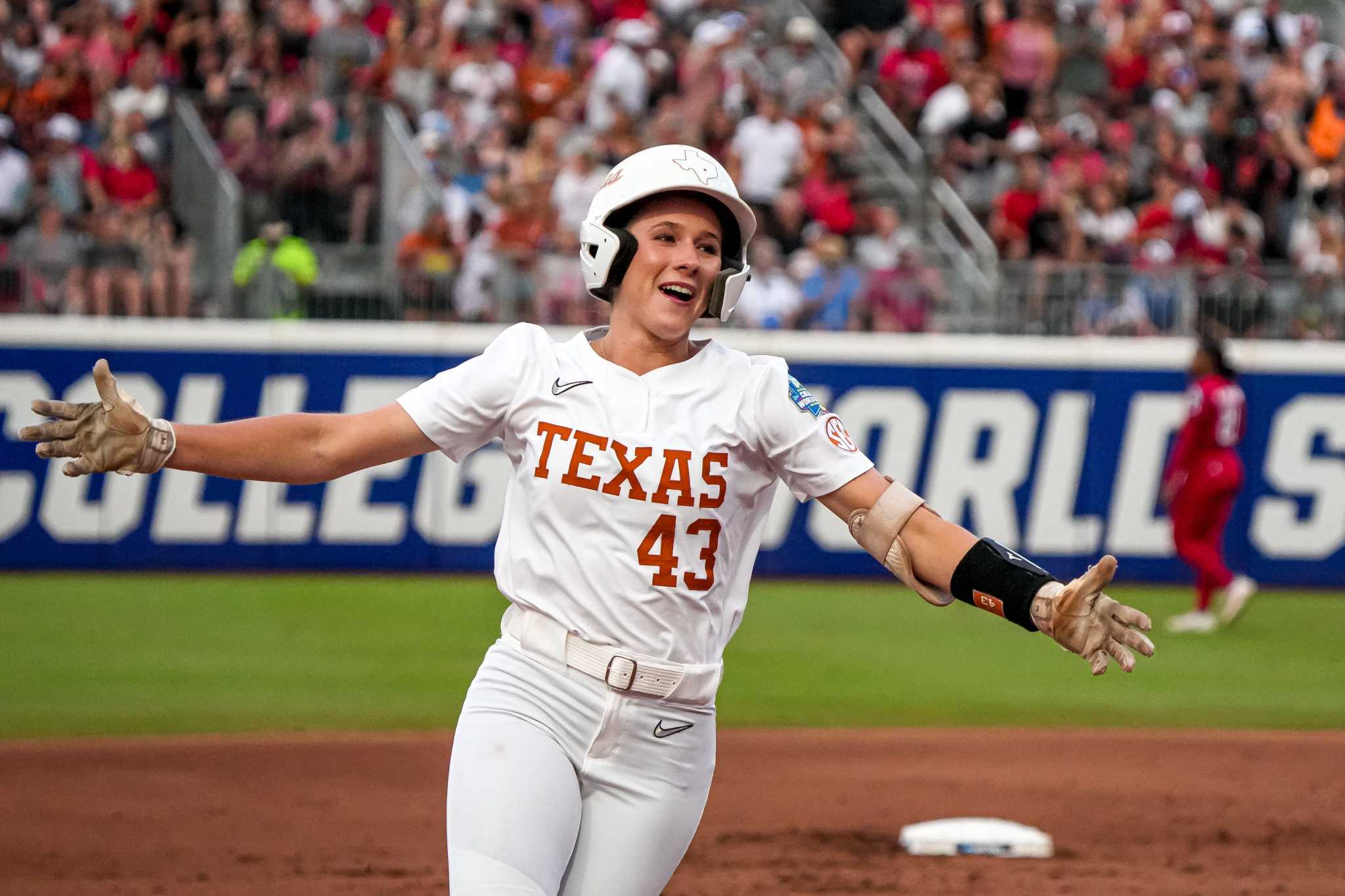 Texas softball unloads bats in season-opening win over No. 10 Nebraska
