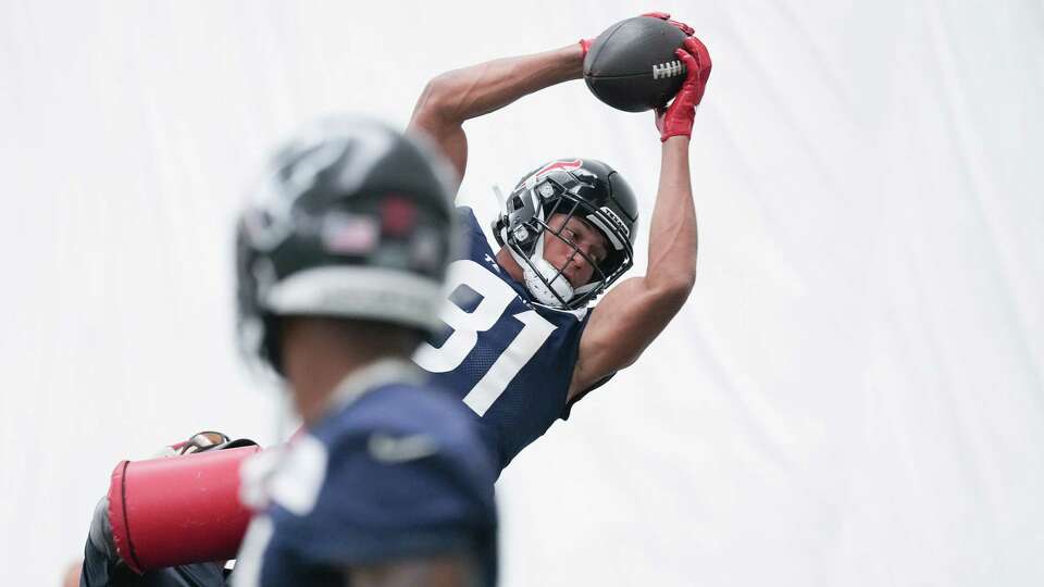 Houston Texans wide receiver Jayden Higgins (81) catches a pass during the team's minicamp at Methodist Training Center in Houston on Wednesday, June 11, 2025.