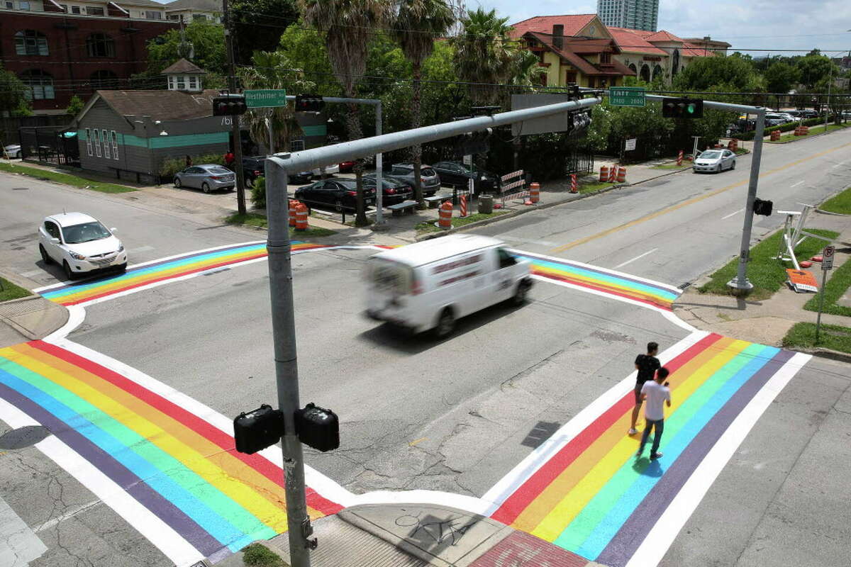 The completed four Rainbow Flag crosswalks at the intersection of Westheimer Road and Taft Street have became a popular spot for photographs Sunday, June 18, 2017, in Houston.