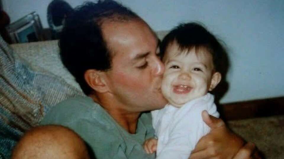 A childhood photo of Priscilla Mendez with her dad, circa 