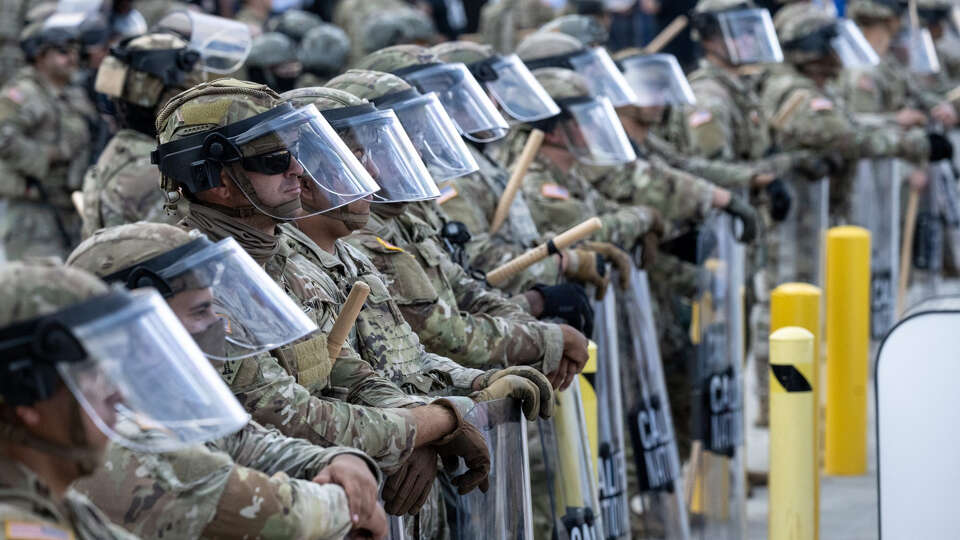 Members of the National Guard in front of the Metropolitan Detention Center in Los Angeles on June 11, 2025.