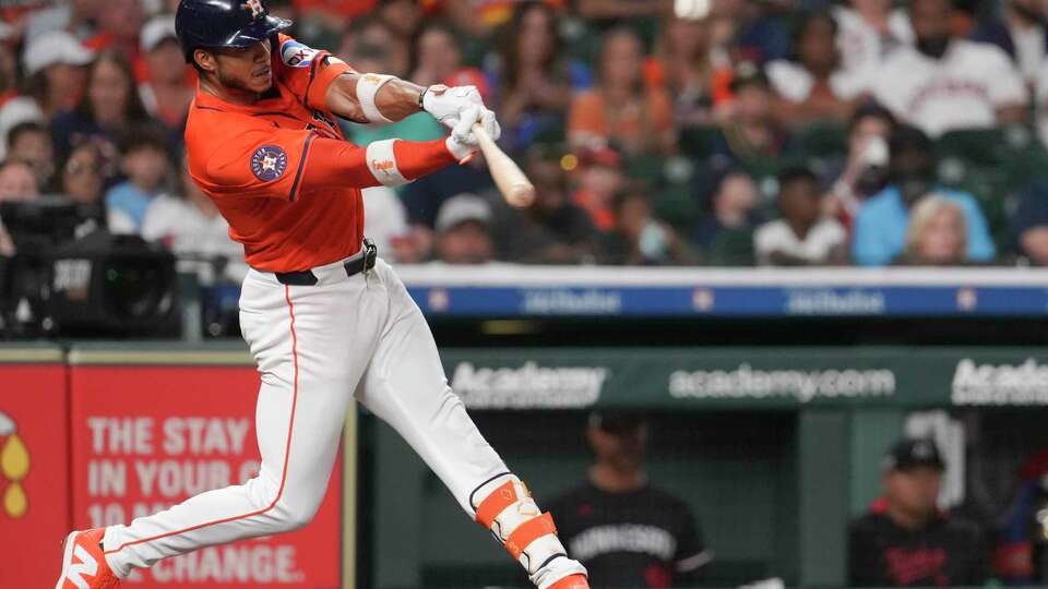 Houston Astros Jeremy Peña (3) hits a single in the second inning of an MLB baseball game in Houston, Friday, June 13, 2025.