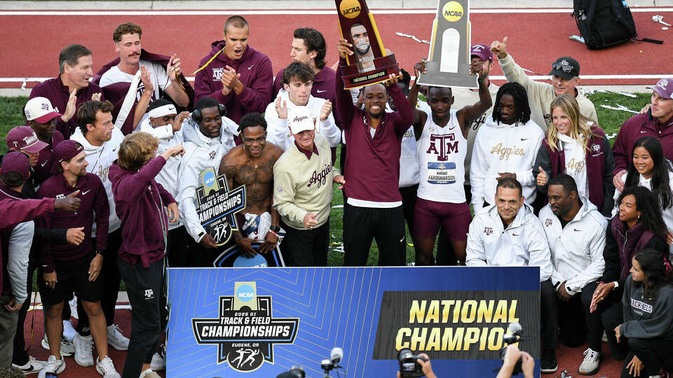 The Texas A&M Aggies hoist the NCAA Trophy after being crowned co-champion in the men's championship during the Division I Men's and Women's Track and Field Championship held at Hayward Field on June 13, 2025 in Eugene, Oregon. (Photo by Isaac Wasserman/NCAA Photos via Getty Images)
