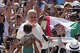 Pope Leo XIV greeting the crowd during his arrival