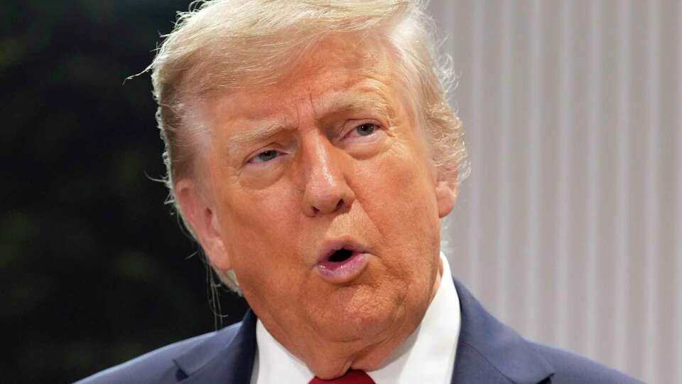 President Donald Trump speaks during a meeting with Canada's Prime Minister Mark Carney on the sidelines of the G7 Summit, Monday, June 16, 2025, in Kananaskis, Canada. (AP Photo/Mark Schiefelbein)