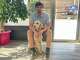 Jordan White with his dog Riley in the new Summit Shield Insurance office
