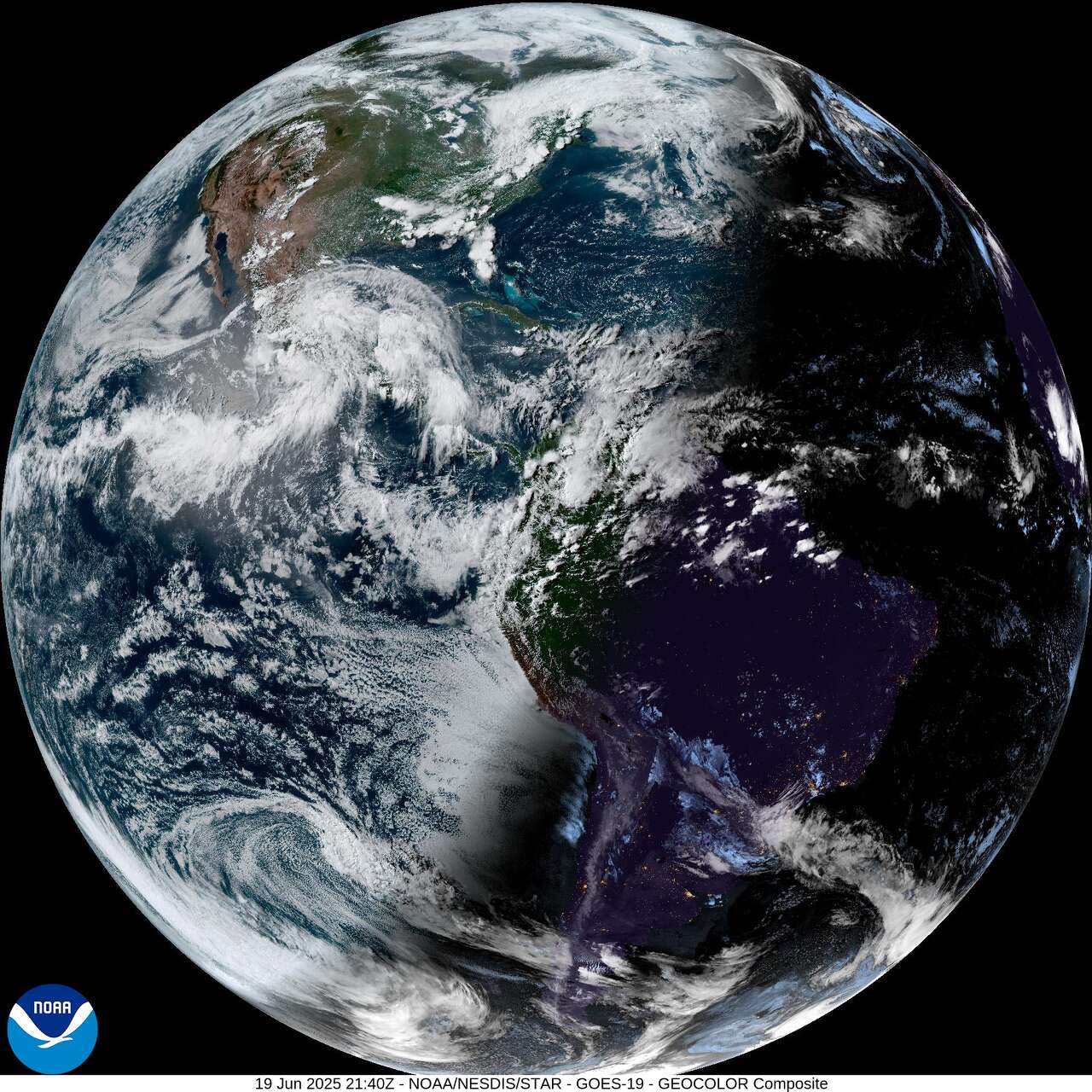 This weather satellite photo of the Western Hemisphere taken around 4 p.m. Thursday, the night before the summer solstice, shows the Earth's poles vertically aligned, but the North Pole is actually tilted toward the sun near its maximum 23.5-degree angle.