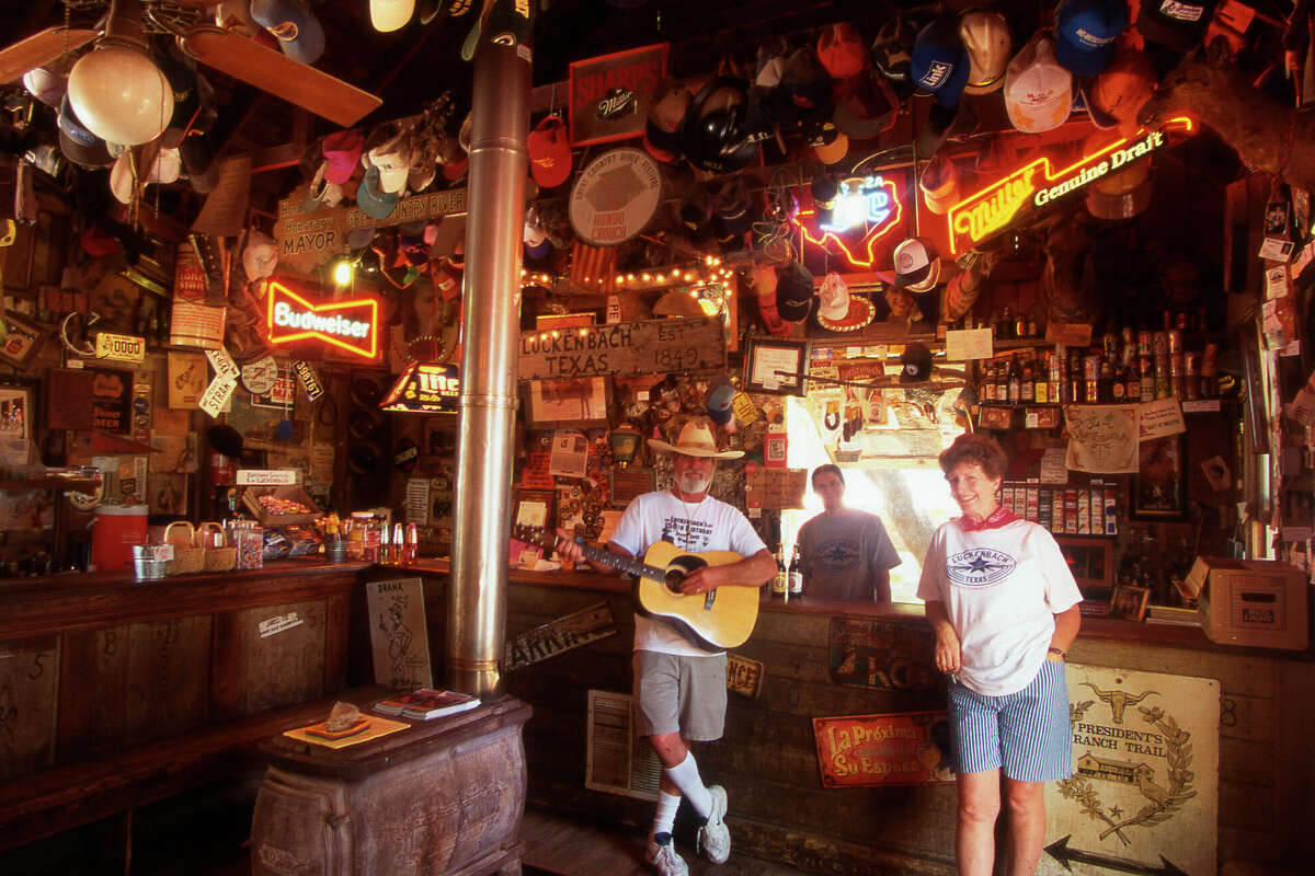 Musician Jimmy Lee kicks back in the General Store in Luchenbach, Texas. The town is noted for having the 'Best Dance Hall in Texas' and the cowboy musicians jamming on Friday, Saturday and Sundays for a free beer.