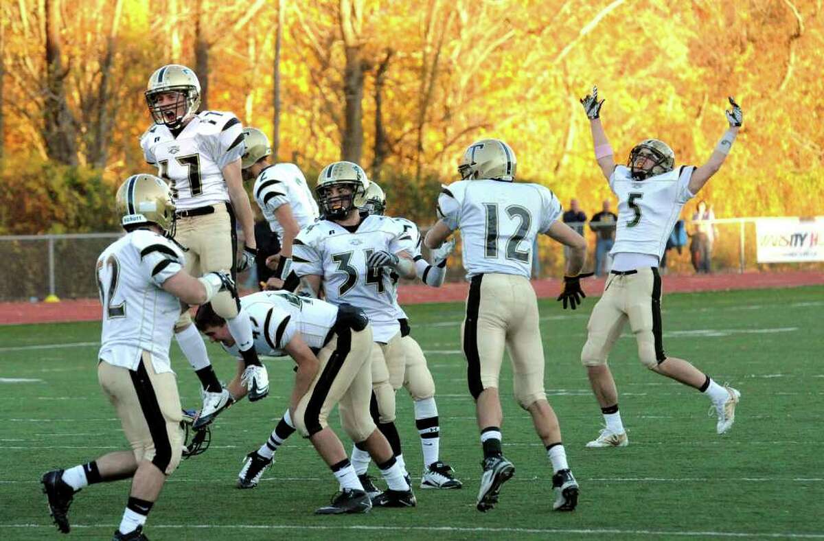 Trumbull celebrates their win over Staples 15-13, during football action in Westport, Conn. on Saturday November 13, 2010.