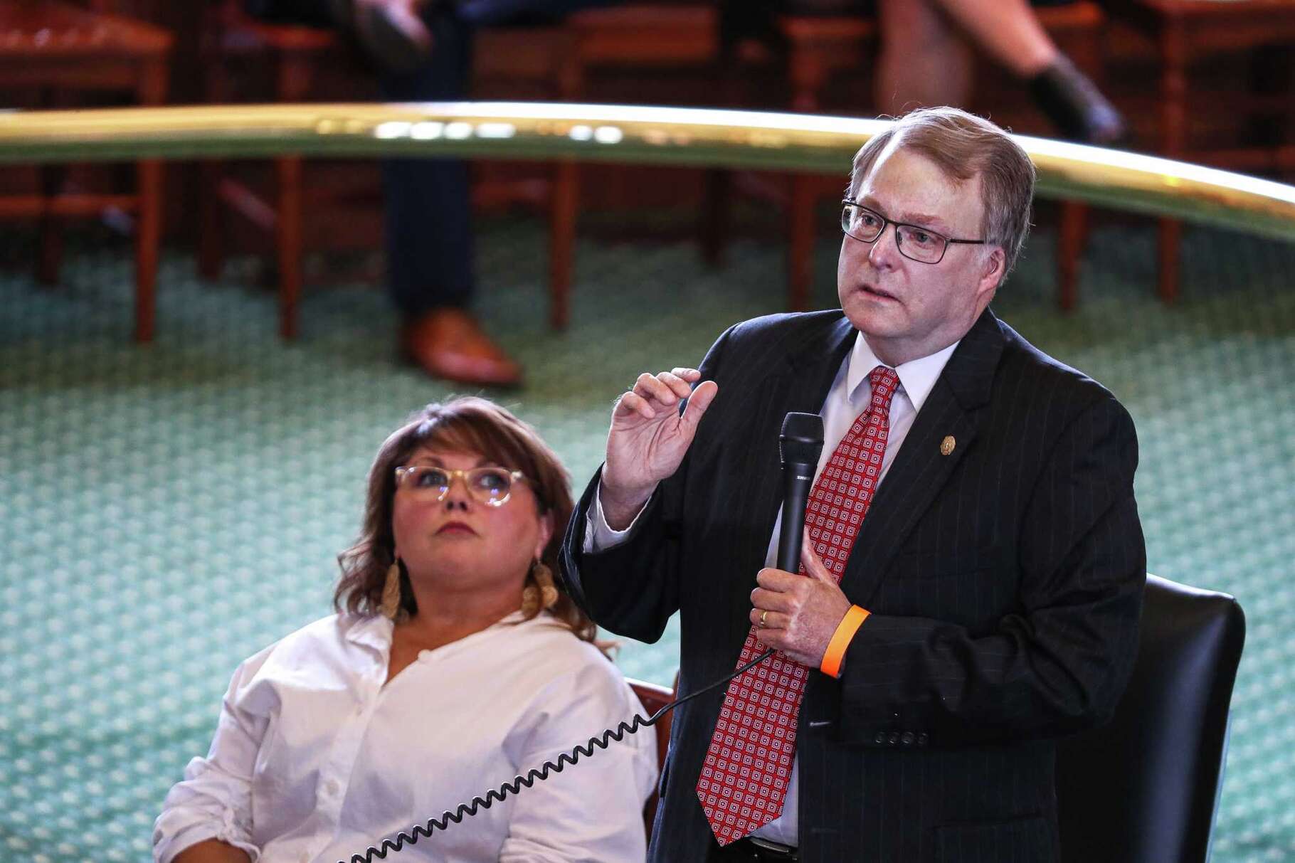 Texas Senator Brian Birdwell, backed by his wife Mel, who joined him in the Senate, addresses the Senate about the 20th Anniversary of the Sept. 11, 2001 attacks, during which Senator Birdwell was severely injured at the Pentagon. The Texas Senate met for the start of a new special session on Sept. 20, 2021.